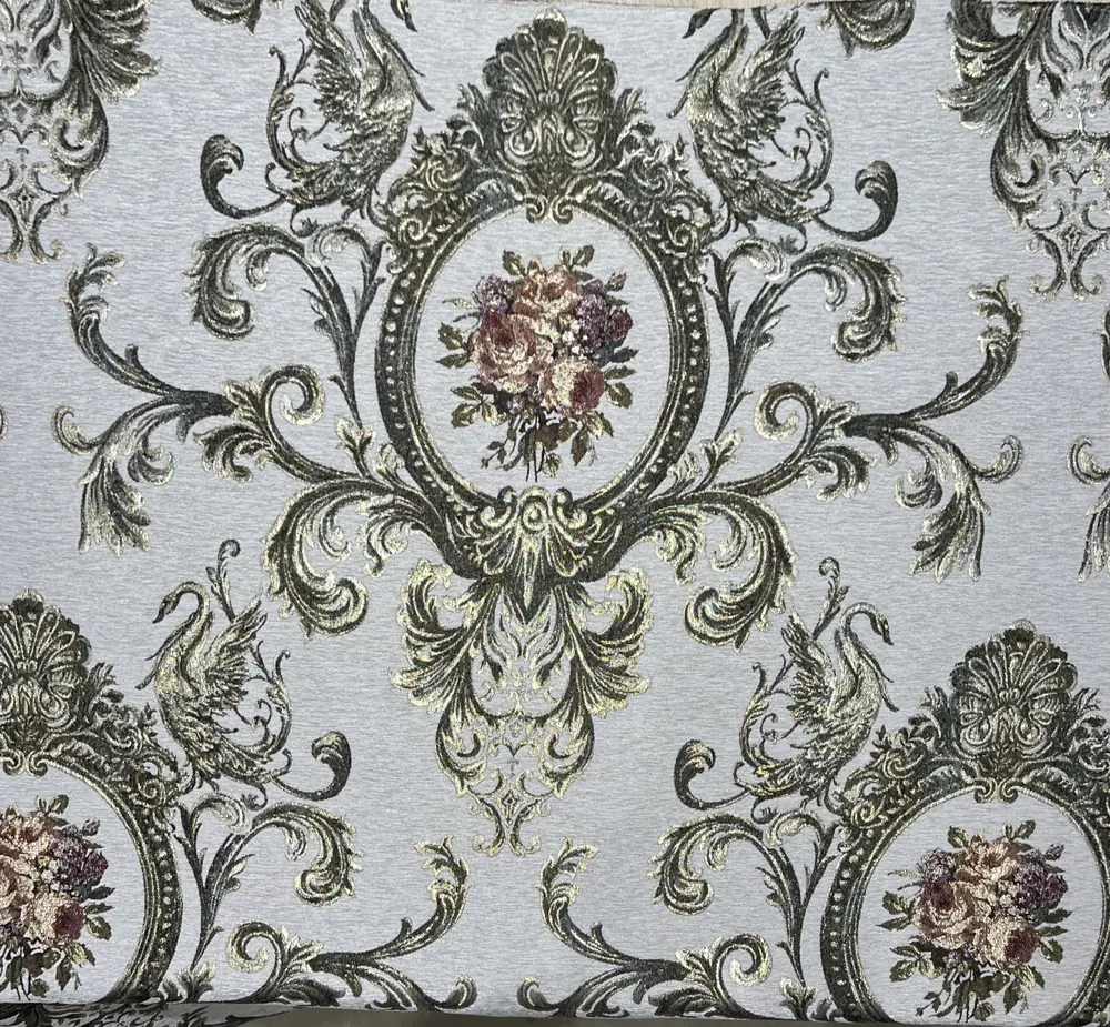 Macro detail of gold-floral damask jacquard fabric by Huaming Fabric
